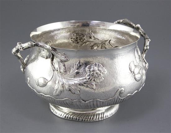 A late Victorian textured silver two handled fruit bowl by Carrington & Co, 27.5 oz.
